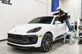 Technician applying ceramic coating